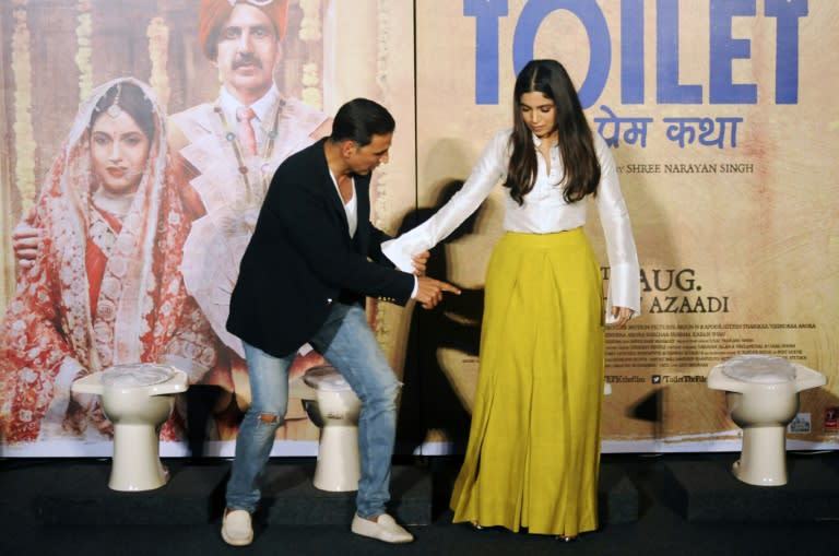 Akshay Kumar (L) and Bhumi Pednekar star in 'Toilet: Ek Prem Katha' ('Toilet: A Love Story') which is inspired by the true-life tale of one man's battle to build toilets in his village in rural India