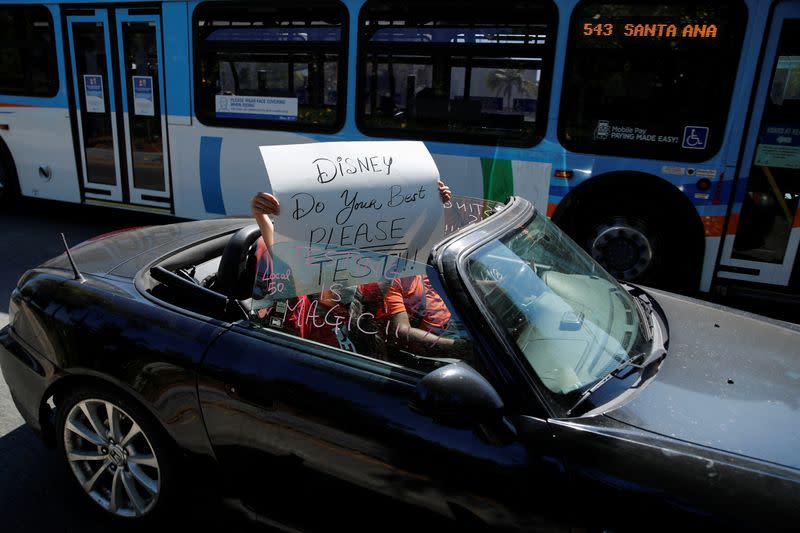 Disney cast members stage a car caravan outside Disneyland California, calling for higher safety standards for Disneyland to reopen