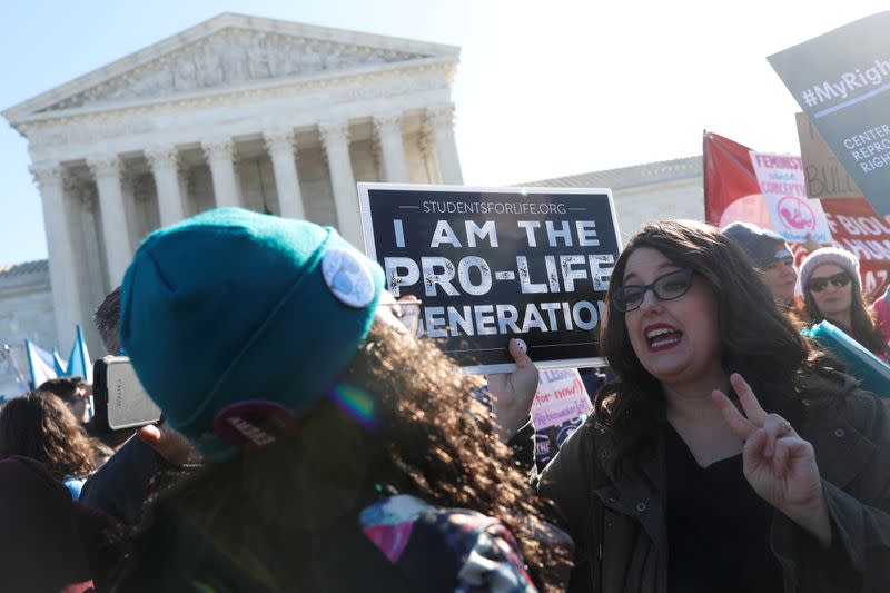 FILE PHOTO: U.S. Supreme Court justices hear a major abortion case on the legality of a Republican-backed Louisiana law that imposes restrictions on abortion doctors, on Capitol Hill in Washington