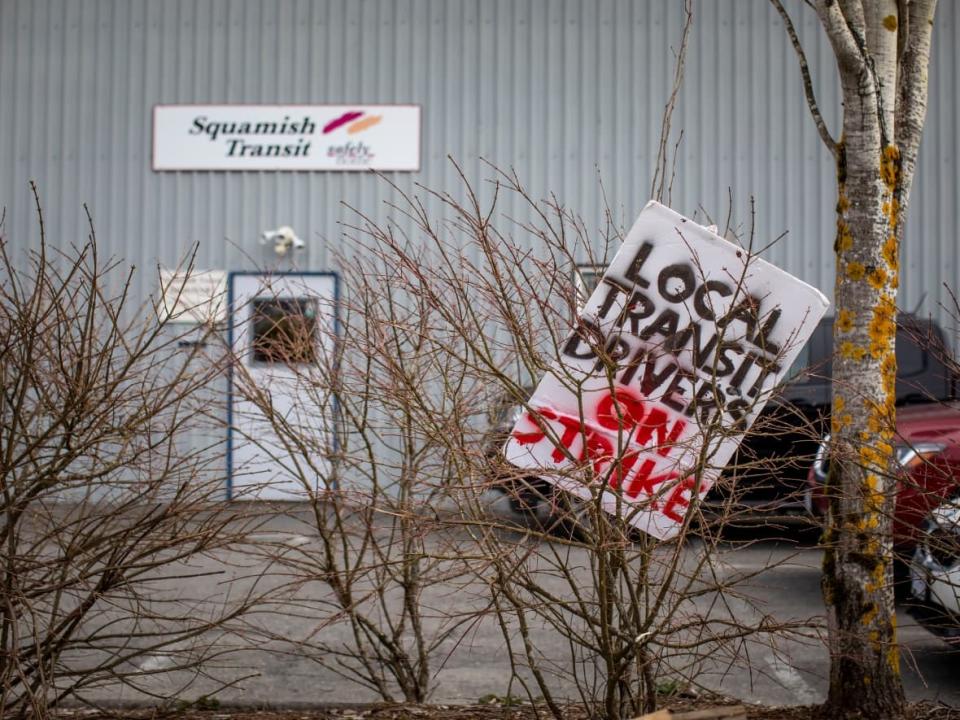 Workers are pictured at the picket line during the Sea to Sky transit strike in Squamish, British Columbia on Thursday April 7, 2022. (Ben Nelms/CBC - image credit)