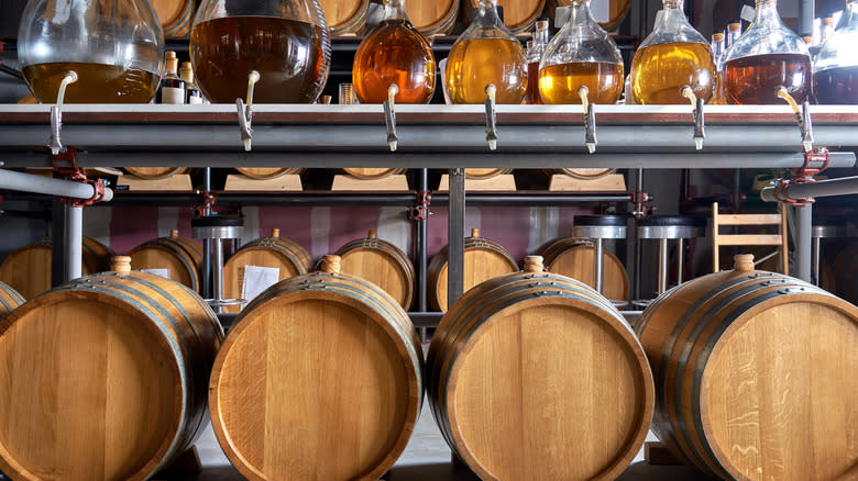 rows of bourbon barrels