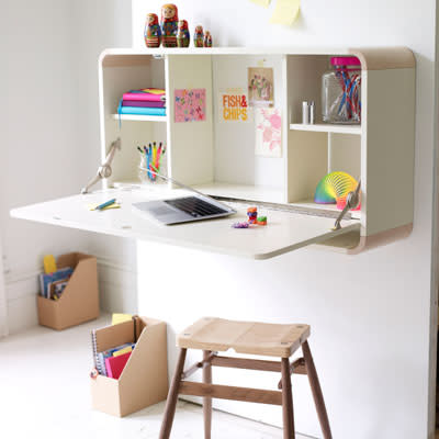 <div class="caption-credit"> Photo by: This Old House</div><div class="caption-title">Fold-Up IKEA Homework Station</div>I love perusing IKEA catalogs for home ideas on my free time. (They recently published the new edition!) This fold-up work station caught my eye. Plenty of room for storage and the open-board is the perfect "table"! It's the ultimate space saver. <br> <i><a rel="nofollow noopener" href="http://blogs.babble.com/the-new-home-ec/2012/08/05/14-stylish-and-space-smart-kids-homework-stations/#fold-up-ikea-homework-station" target="_blank" data-ylk="slk:Get the inspiration here;elm:context_link;itc:0;sec:content-canvas" class="link ">Get the inspiration here</a></i> <br> <b><i><a rel="nofollow noopener" href="http://blogs.babble.com/the-new-home-ec/2011/08/11/10-simple-household-items-for-organization/" target="_blank" data-ylk="slk:Related: 10 household items that double as organizers;elm:context_link;itc:0;sec:content-canvas" class="link ">Related: 10 household items that double as organizers </a></i></b>