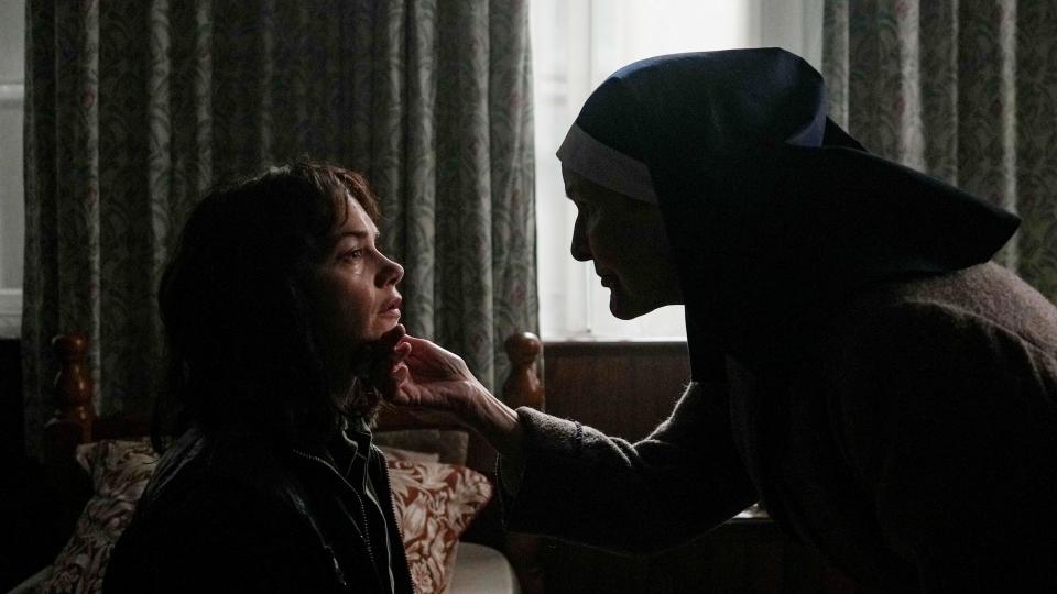 Sister Eileen holds Lorna's face in The Woman In The Wall episode 4