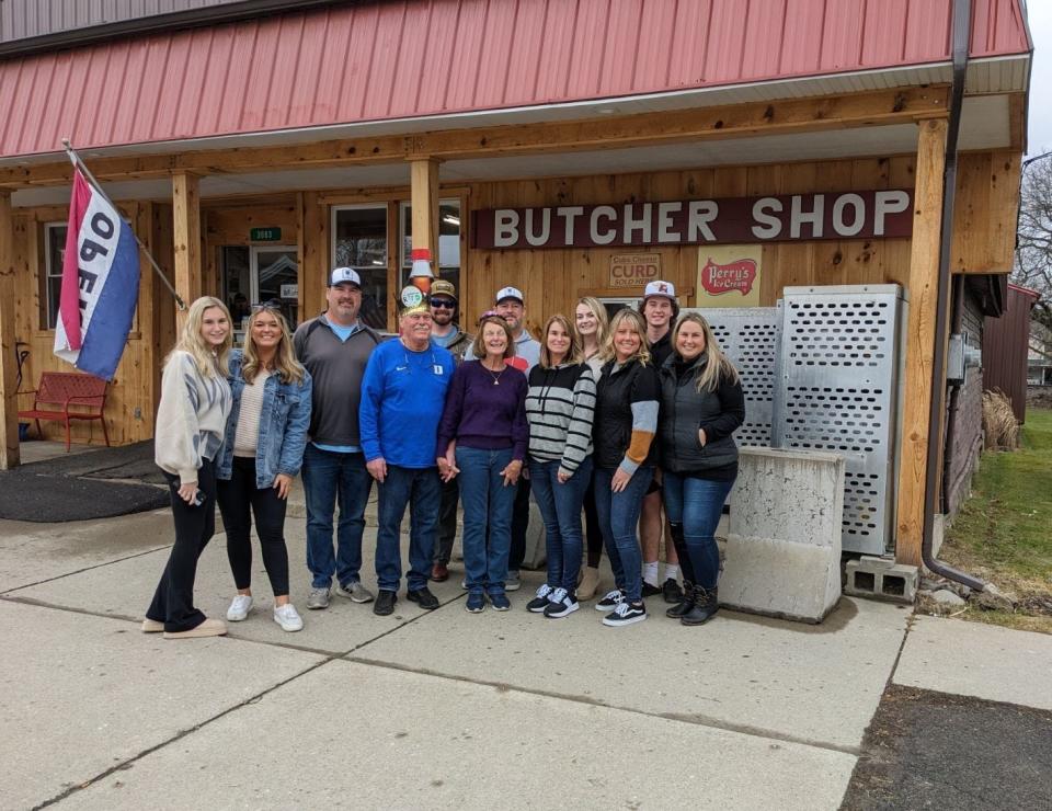 Jim and Cindy Potter, center, are surrounded by their children and grandchildren as the couple said goodbye to The Store in Scio this week. The Potters have owned the business since July 1, 1989.