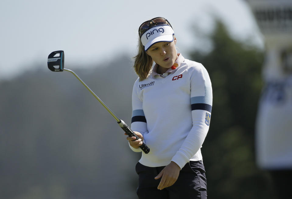 Brooke Henderson, of Canada, reacts after missing a birdie putt on the ninth green of the Lake Merced Golf Club during the first round of the LPGA Mediheal Championship golf tournament Thursday, May 2, 2019, in Daly City, Calif. (AP Photo/Eric Risberg)