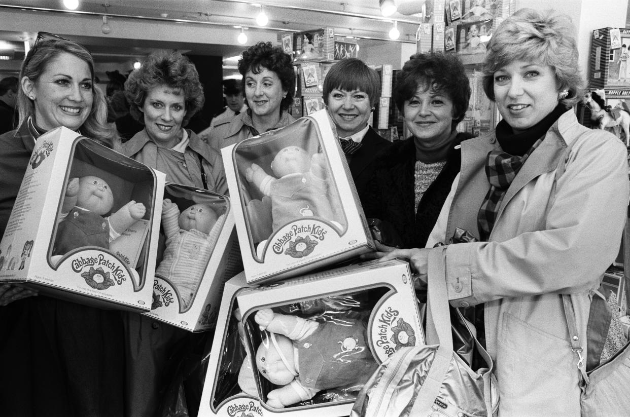Cabbage Patch Kids drew serious shoppers at Christmas 1983. (Andy Hosie/Daily Mirror/Mirrorpix/Getty Images)