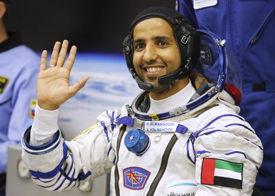 United Arab Emirates astronaut Hazza Almansoori, member of the main crew of the expedition to the International Space Station (ISS), waves prior the launch of Soyuz MS-15 space ship at the Russian leased Baikonur cosmodrome, Kazakhstan, Wednesday, Sept. 25, 2019. (AP Photo/Dmitri Lovetsky)