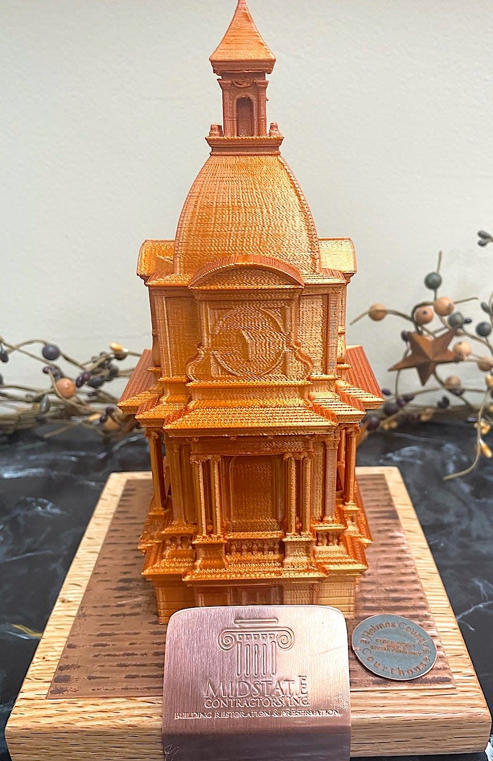 A three-dimensional print of the top of the recently renovated Holmes County Courthouse by Midstate Construction.