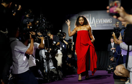 Naomi Osaka of Japan arrives for the singles draw ceremony of the WTA tennis Finals in Singapore October 19, 2018. REUTERS/Edgar Su