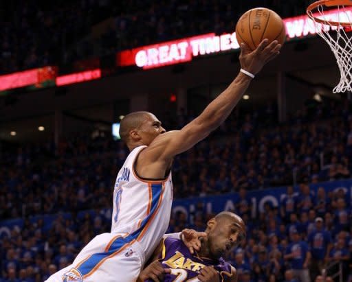 Oklahoma City Thunder's Russell Westbrook shoots over Los Angeles Lakers' Kobe Bryant during game five of their NBA Western Conference series on May 21. Oklahoma City eliminated the Lakers in five games with a dominating 106-90 victory night