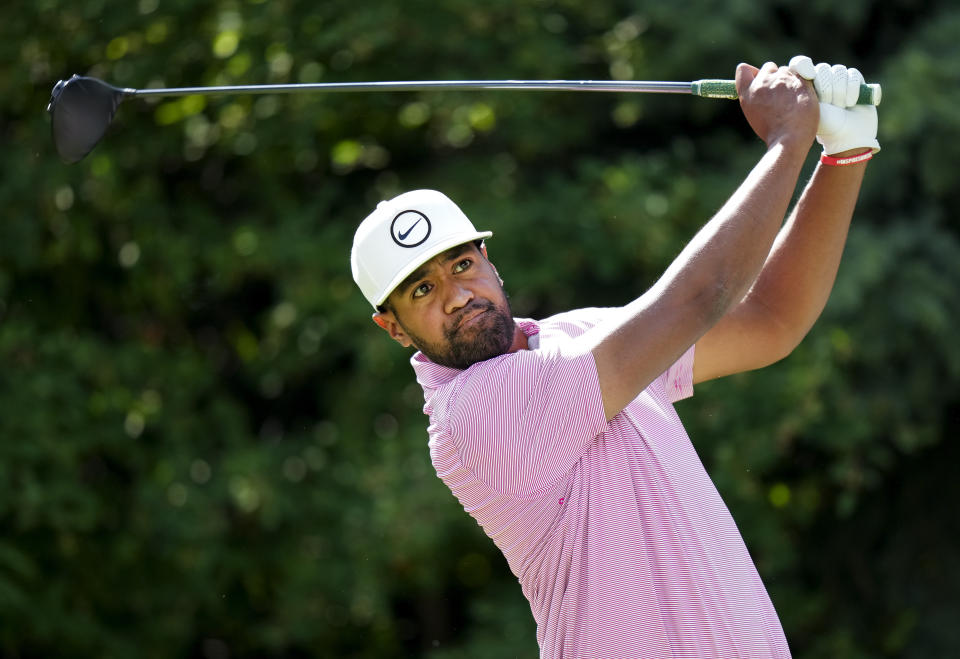 Tony Finau, of the United States, hits his tee shot on the 17th hole during round three of the Canadian Open golf tournament at St. George's Golf and Country Club in Toronto, Saturday, June 11, 2022. (Nathan Denette/The Canadian Press via AP)