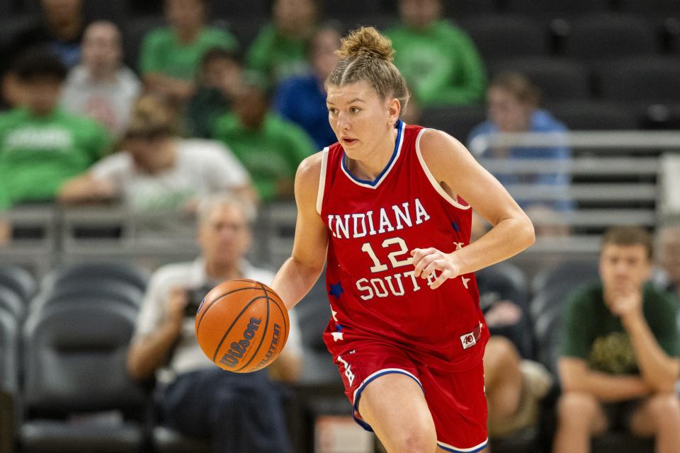 South Future All-Star Juliann Woodard (12), a junior from Jennings County High School, brings the ball up court during the second half of an girlsâ€™ Indiana High School Future All-Stars basketball game, Saturday, June 10, 2023, at Gainbridge Fieldhouse, in Indianapolis.