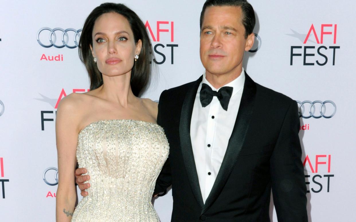 Angelina Jolie, left, and Brad Pitt separated in September 2016  - Invision