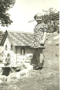 The author's mother is pictured at age 3 in 1935 at the family's backyard garden.