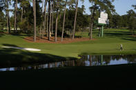 Corey Conners, of Canada, walks down the 16th fairway during the second round of the Masters golf tournament Friday, Nov. 13, 2020, in Augusta, Ga. (AP Photo/Charlie Riedel)