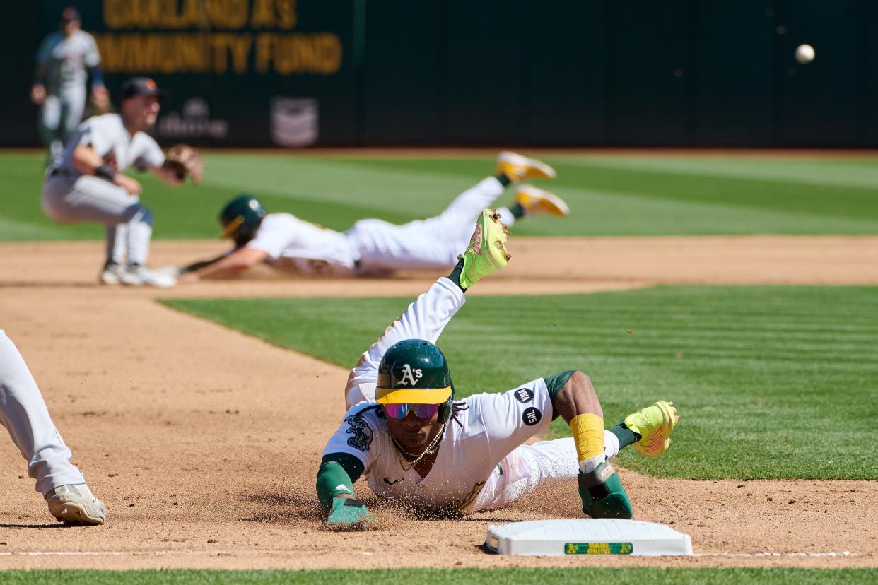 Sept. 24: The Oakland Athletics' Esteury Ruiz (1) and Zack Gelof execute a double steal against the Detroit Tigers during the fourth inning at Oakland-Alameda County Coliseum.