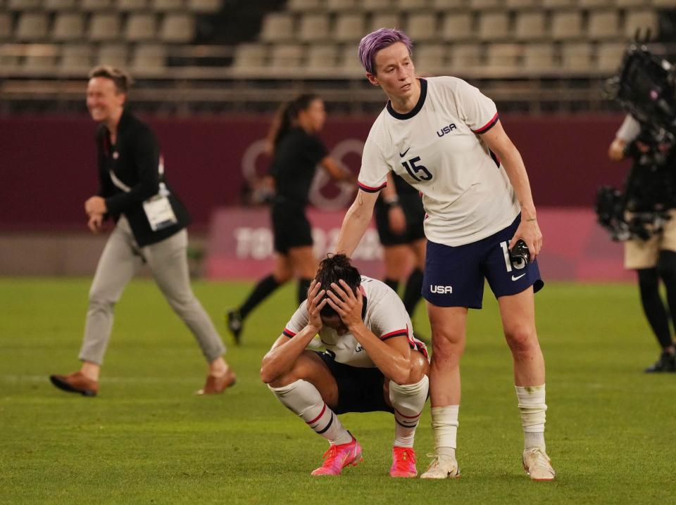 Megan Rapinoe comforts teammate Carli Lloyd.