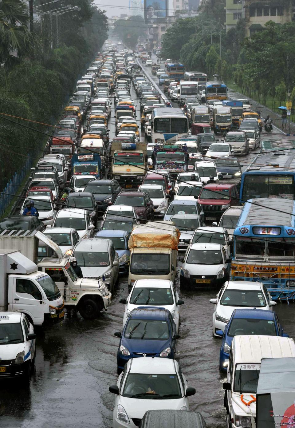 <div class="paragraphs"><p>Vehicles wade through the waterlogged VIP road.</p></div>