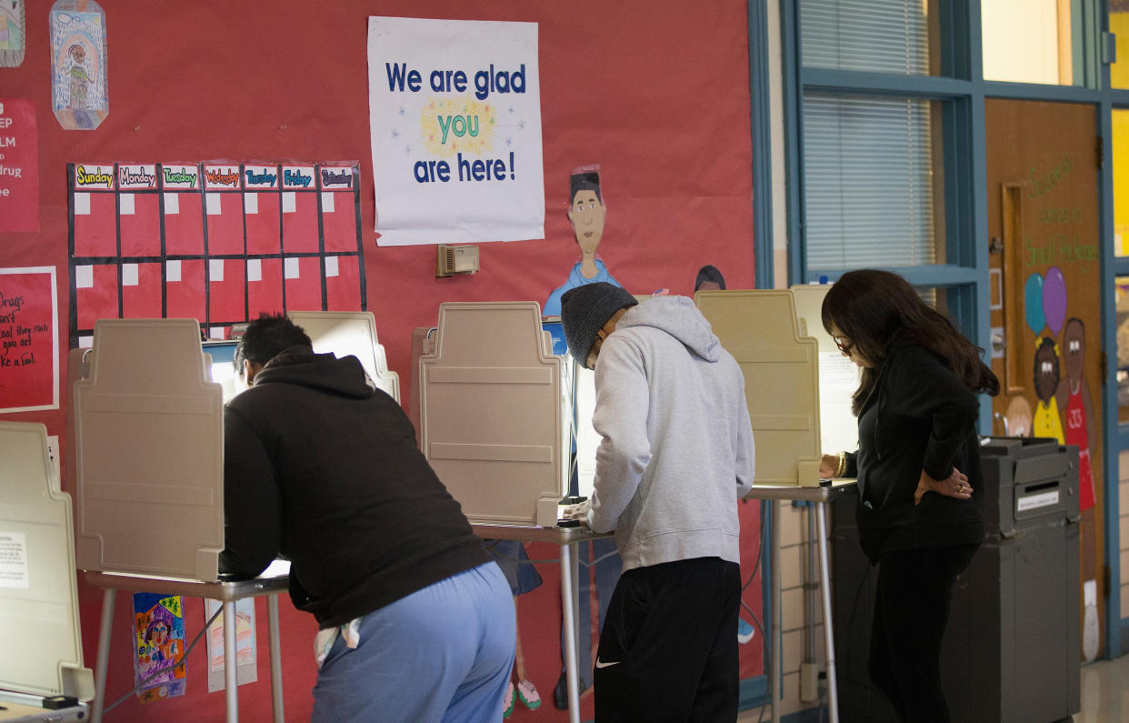 Americans&nbsp;cast their votes&nbsp;in Ferguson, Missouri, on Nov. 4, 2014. (Photo: Scott Olson via Getty Images)