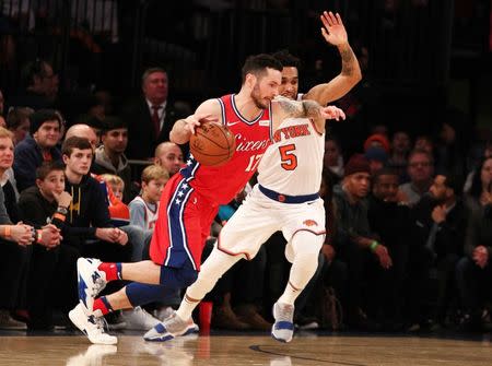 FILE PHOTO: Dec 25, 2017; New York, NY, USA; Philadelphia 76ers guard J.J. Redick (17) dribbles the ball against New York Knicks guard Courtney Lee (5) during the first half at Madison Square Garden. Mandatory Credit: Andy Marlin-USA TODAY Sports/File Photo