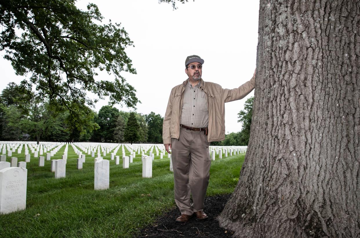 Don Milne has created an app which will document every U.S. service man and woman in WWII. He is seen at Zachary Taylor National Cemetery in Louisville. May 23, 2022