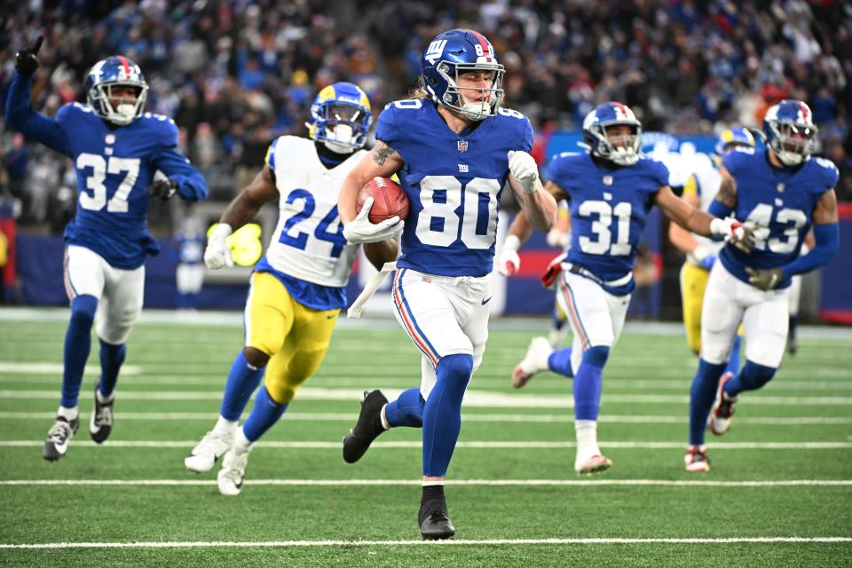 EAST RUTHERFORD, NEW JERSEY - DECEMBER 31: Gunner Olszewski #80 of the New York Giants runs with the ball during the fourth quarter against the Los Angeles Rams at MetLife Stadium on December 31, 2023 in East Rutherford, New Jersey. (Photo by Mike Lawrence/Getty Images)