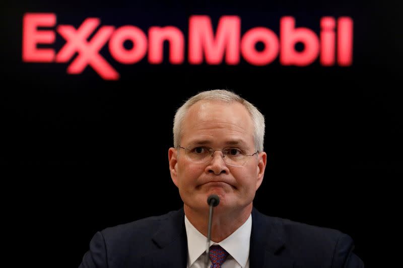 FILE PHOTO: FILE PHOTO: Darren Woods, CEO of Exxon Mobil Corp is seen at a news briefing in New York, U.S., March 1, 2017. REUTERS/Brendan McDermid