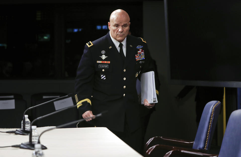 Army Maj. Gen. Roger L. Cloutier, right,  chief of staff, U.S. Africa Command, and lead investigating officer, arrives to brief members of the media at the Pentagon, Thursday, May 10, 2018. (Pablo Martinez Monsivais/AP)