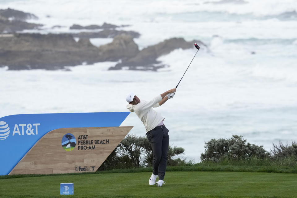 Scottie Scheffler hits from the fourth tee on the Spyglass Hill Golf Course during the first round of the AT&T Pebble Beach National Pro-Am golf tournament Thursday, Feb. 1, 2024, in Pebble Beach, Calif. (AP Photo/Eric Risberg)