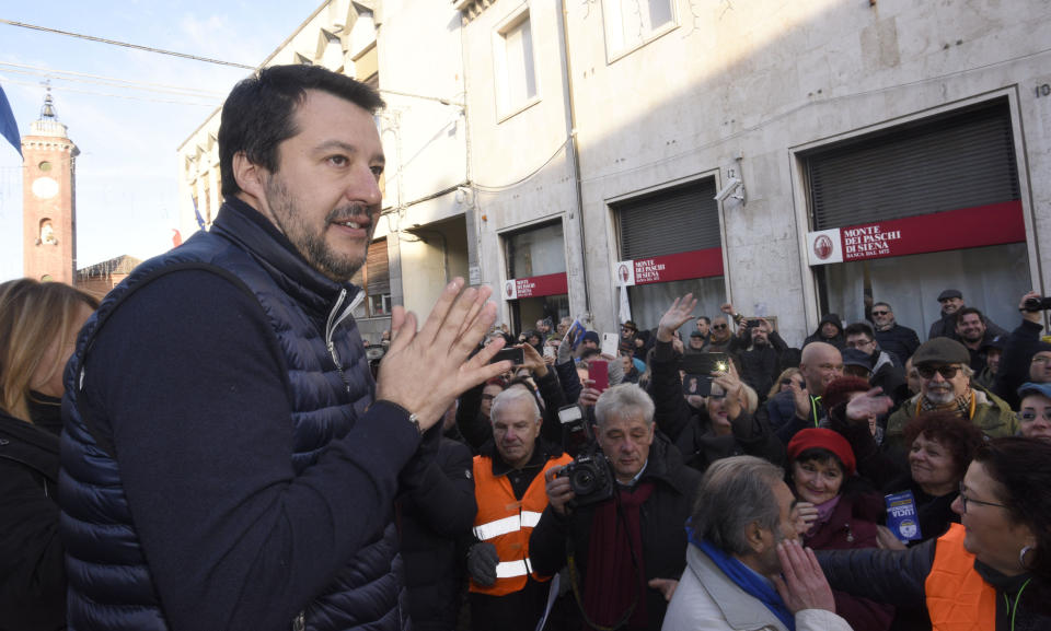 League's leader Matteo Salvini meets people during a campaign rally in view of the upcoming local elections in the Emilia Romagna region, in Comacchio, Italy, Monday, Jan. 20, 2020. A Senate commission on parliamentary immunity voted to lift immunity Salvini to put him on trial for alleged kidnapping for keeping migrants aboard a rescue ship when he was interior minister, but nothing is definite, since the whole Senate must decide on immunity in February. (Stefano Cavicchi/LaPresse via AP)