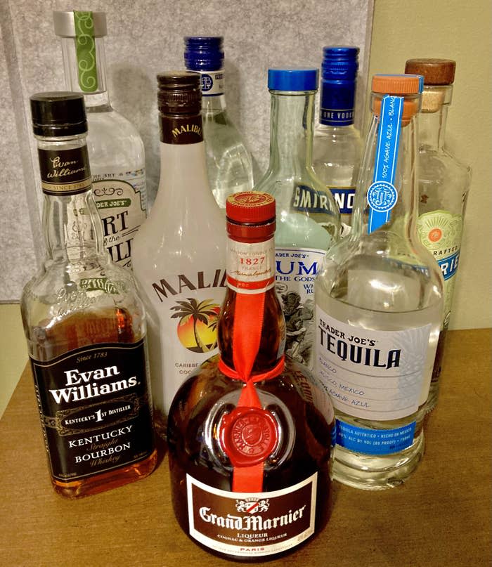 bottles of tequila, bourbon, rum, and vodka