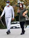 <p>David Foster and pregnant wife Katharine McPhee take their puppy for a stroll on Monday in Beverly Hills. </p>