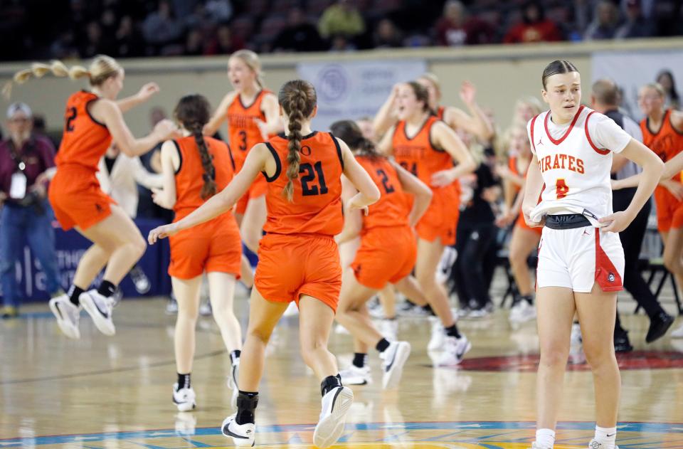 Dale's Ava Bell (4) reacts as Merritt celebrates the class 2A girls state championship basketball game at the State Fair Arena in Oklahoma City, Saturday, March 9, 2024.