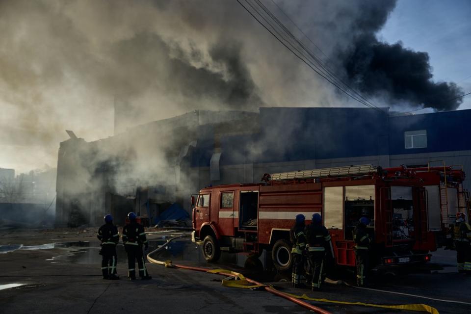 The State Emergency Service is carrying out work to extinguish a fire at a warehouse on Dec. 29, 2023, in Kyiv, Ukraine. (Kostiantyn Liberov/Libkos/Getty Images)