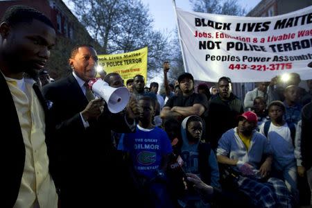 Maryland State Delegate Keith E. Haynes, speaks to the crowd outside of the Baltimore Police Department's Western District police station during a rally for Freddie Gray, in Baltimore, April 21, 2015. REUTERS/Jose Luis Magana