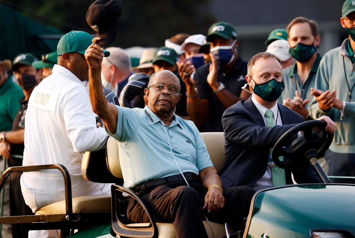 Lee Elder acknowledges the crowd as he leaves the No. 1 tee during Thursday's first round for the 2021 Masters Tournament at Augusta National Golf Club.