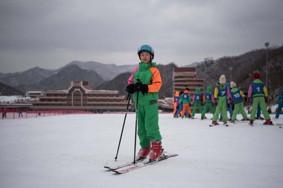 Pak Han-Song, 11, poses for a portrait on a beginner's slope at the Masikryong, or Masik Pass, ski resort near Wonsan. AFP was told that Pak was a member of a youth ski camp.