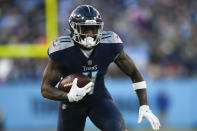 Tennessee Titans wide receiver A.J. Brown (11) run s against the Cincinnati Bengals during the first half of an NFL divisional round playoff football game, Saturday, Jan. 22, 2022, in Nashville, Tenn. (AP Photo/John Amis)