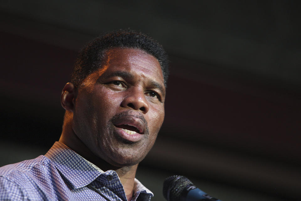 FILE - Herschel Walker, GOP candidate for the US Senate for Georgia, speaks at a primary watch party on May 23, 2022, at the Foundry restaurant in Athens, Ga. According to a new report published late Monday, Oct. 3 Walker, who has vehemently opposed abortion rights as the Republican nominee for U.S. Senate in Georgia, paid for an abortion for his girlfriend in 2009 The candidate called the accusation a “flat-out lie” and threatened to sue. (AP Photo/Akili-Casundria Ramsess, File)