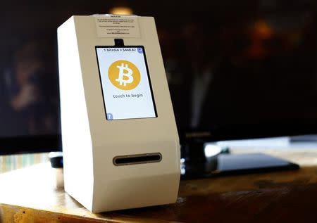 A bitcoin ATM machine is shown at a restaurant in San Diego, California September 18, 2014. REUTERS/Mike Blake