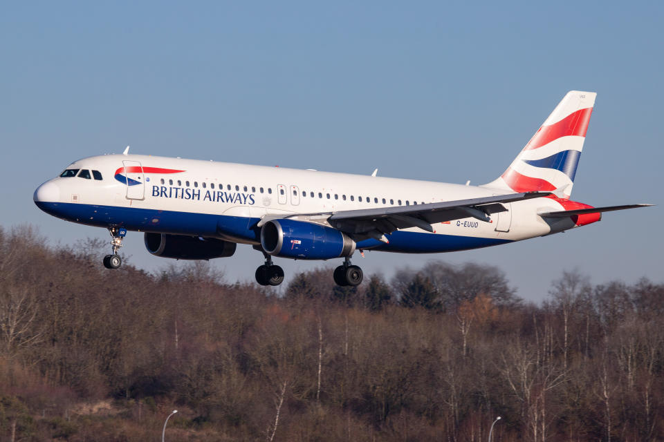 British Airways Airbus A320-200 with registration G-EUUO landing at Luxembourg Findel International Airport LUX ELLX in the blue sky. BA connects Luxembourg city to London Heathrow International Airport LHR EGLL in England, UK. BritishAirways is part of Oneworld Aviation Alliance. 