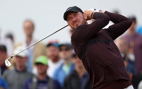 England's Chris Wood tees off the 5th during day three of The Open - Credit: PA