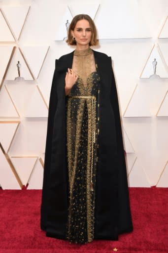 Actress Natalie Portman wears the cape containing the names of female filmmakers who were not nominated for a best director Oscar