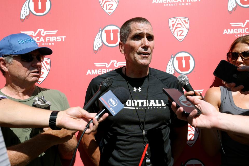 Utah Utes offensive coordinator and quarterbacks coach Andy Ludwig talks to members of the media after the first day of fall camp outside of the Spence and Cleone Eccles Football Center in Salt Lake City on Wednesday, Aug. 3, 2022.