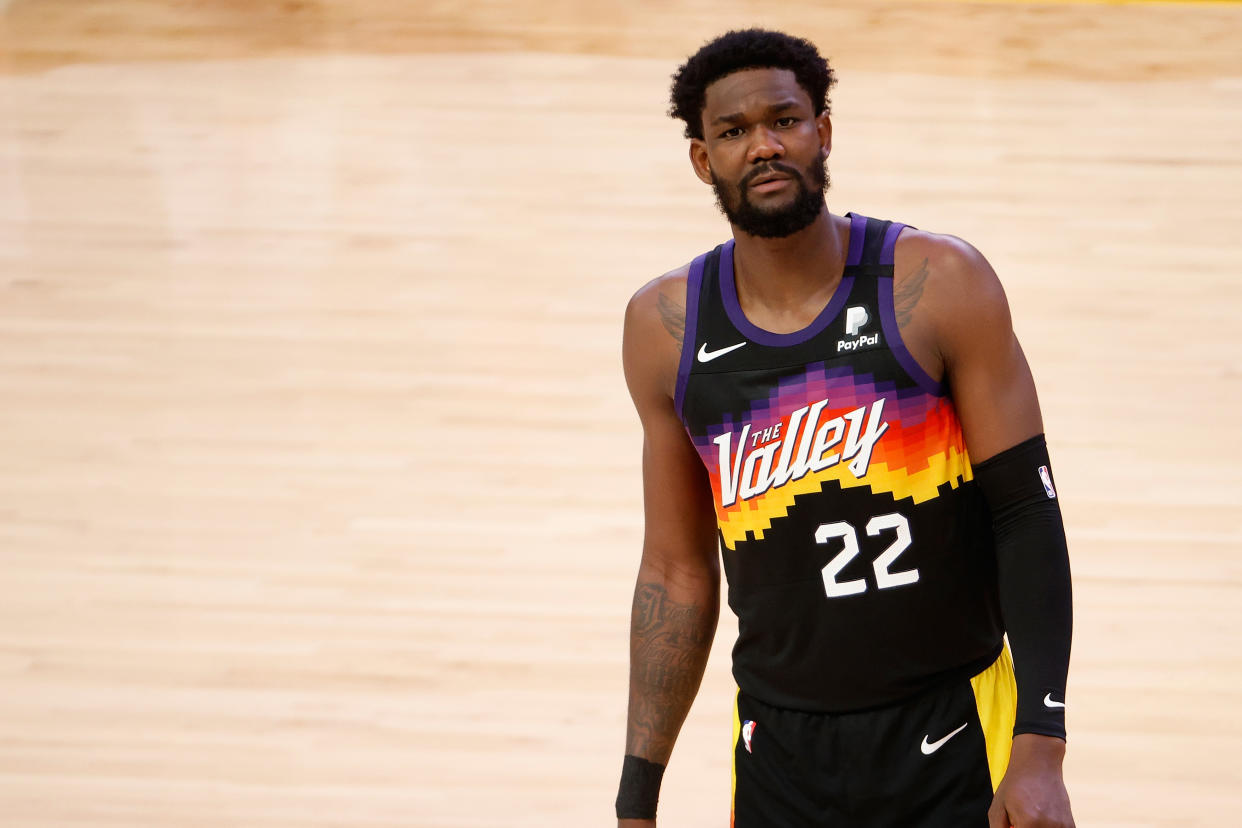 PHOENIX, ARIZONA - JULY 17:  Deandre Ayton #22 of the Phoenix Suns reacts in the first half of game five of the NBA Finals at Footprint Center on July 17, 2021 in Phoenix, Arizona.  NOTE TO USER: User expressly acknowledges and agrees that, by downloading and or using this photograph, User is consenting to the terms and conditions of the Getty Images License Agreement.  (Photo by Christian Petersen/Getty Images)