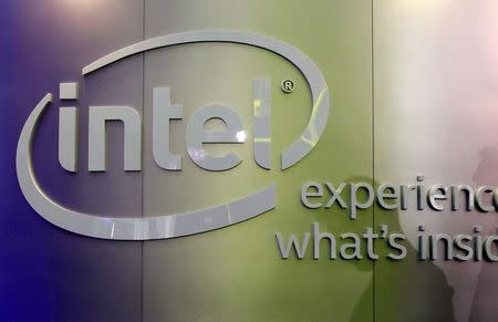 Shadows are cast near an Intel logo at the Intel booth during the 2015 Computex exhibition at the TWTC Nangang exhibition hall in Taipei, Taiwan, June 2, 2015. REUTERS/Pichi Chuang