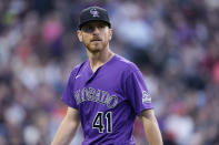 Colorado Rockies starting pitcher Chad Kuhl heads to the dugout after getting San Francisco Giants' Tommy La Stella to ground out to end the top of the third inning of a baseball game Tuesday, May 17, 2022, in Denver. (AP Photo/David Zalubowski)