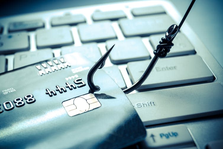 <span class="caption">Phishing involves scammers trying to extract valuable personal data from victims, usually via email.</span> <span class="attribution"><a class="link " href="https://www.shutterstock.com/image-photo/credit-card-phishing-attack-322068299?src=qoN45-dDUEsveWi7H4-prg-1-2" rel="nofollow noopener" target="_blank" data-ylk="slk:www.shutterstock.com;elm:context_link;itc:0;sec:content-canvas">www.shutterstock.com</a></span>