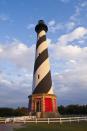 <p><strong>Where: </strong>Cape Hatteras Lighthouse, North Carolina</p><p><strong>Why We Love It: </strong>While this Outer Banks landmark is the world's tallest brick lighthouse, its graphic black and white spiral is what landed it on this list of beautiful places.</p><p><strong>RELATED:</strong> <a href="https://www.countryliving.com/life/travel/g2422/the-30-prettiest-lighthouses-in-america/" rel="nofollow noopener" target="_blank" data-ylk="slk:The Most Beautiful Lighthouses in America;elm:context_link;itc:0;sec:content-canvas" class="link ">The Most Beautiful Lighthouses in America</a><br></p>