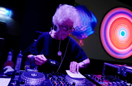 DJ Wika Szmyt, 80, plays music at a club in Warsaw, Poland March 25, 2019. Picture taken March 25, 2019. REUTERS/Kacper Pempel